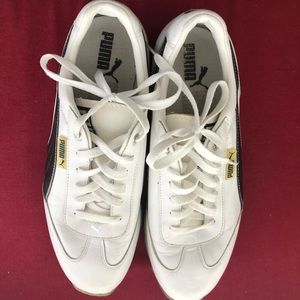 Puma mens white and black size 10.5 sneakers.